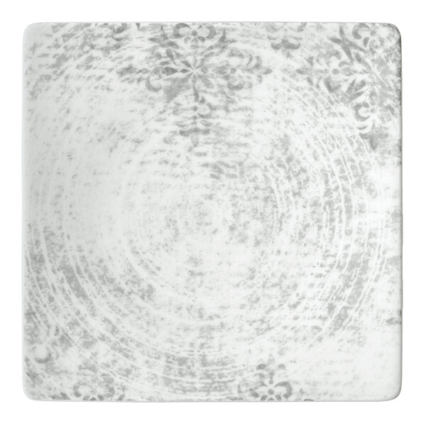 A white square Schonwald porcelain coupe plate with a grey pattern.