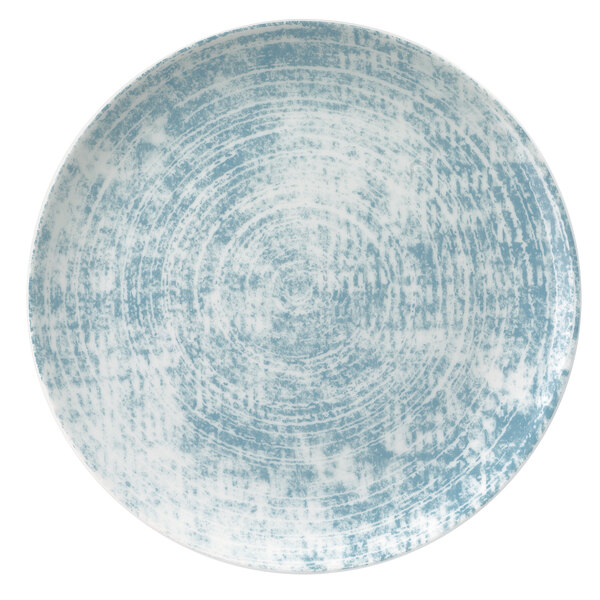 A Schonwald blue porcelain coupe plate with a white rim.