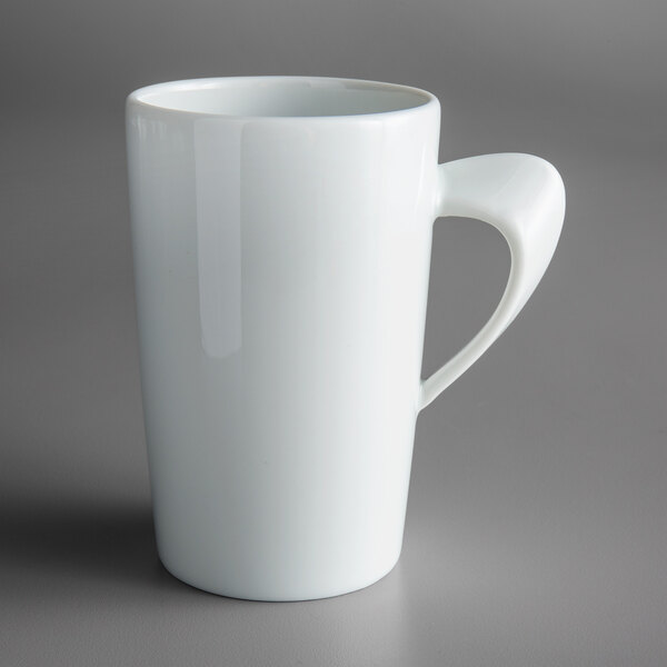 A Schonwald white porcelain mug with a handle.