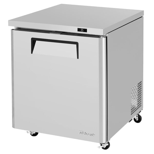 A stainless steel Turbo Air M3 Series undercounter refrigerator with a door open.