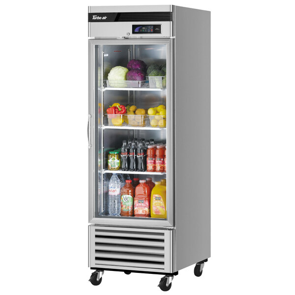 A Turbo Air reach-in refrigerator with food on the shelves.