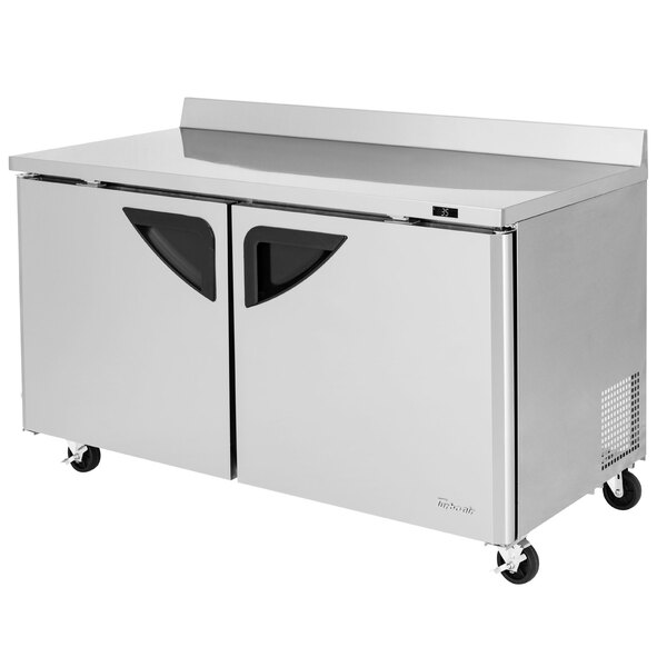A stainless steel Turbo Air worktop refrigerator with two doors and two drawers.