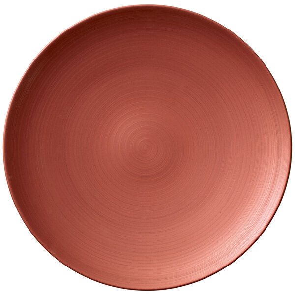 A Villeroy & Boch Copper Glow porcelain plate with a brown rim.