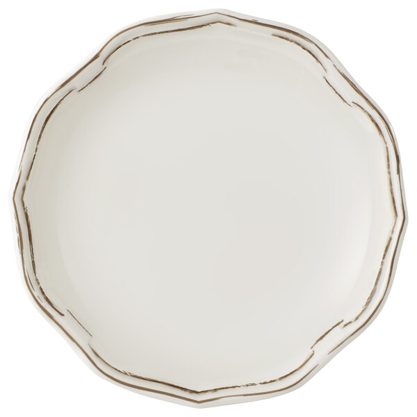 A white Villeroy & Boch porcelain coupe plate with gold trim.