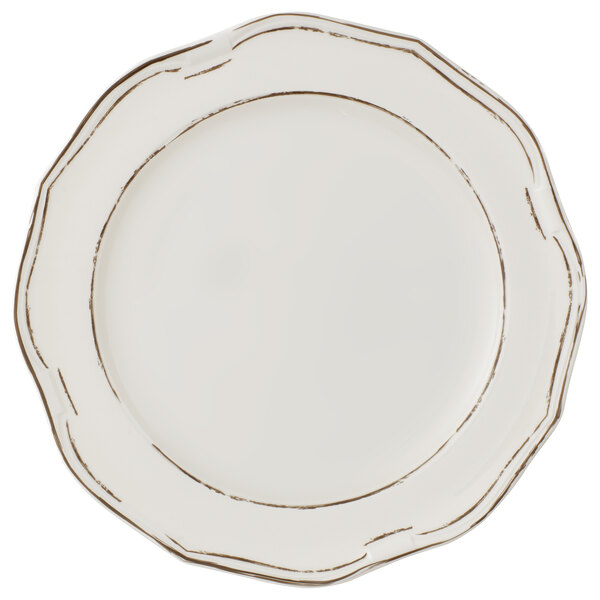 A white Villeroy & Boch premium porcelain round platter with a brown and white rim.