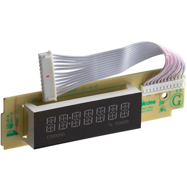 The Solwave display control board with white wires and a digital display.