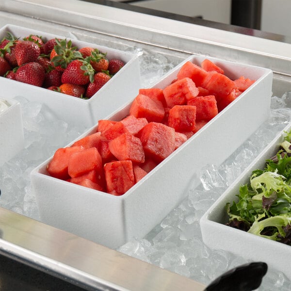 A G.E.T. Enterprises Bugambilia white rectangular bowl filled with cubed strawberries and watermelon.