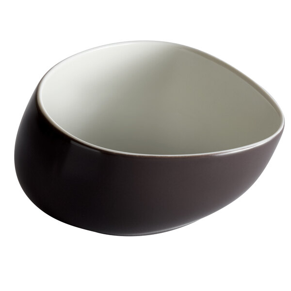 A Schonwald black porcelain bowl with a white rim.