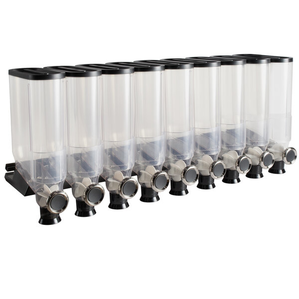 A row of clear plastic cereal dispensers with black lids on a white shelf.