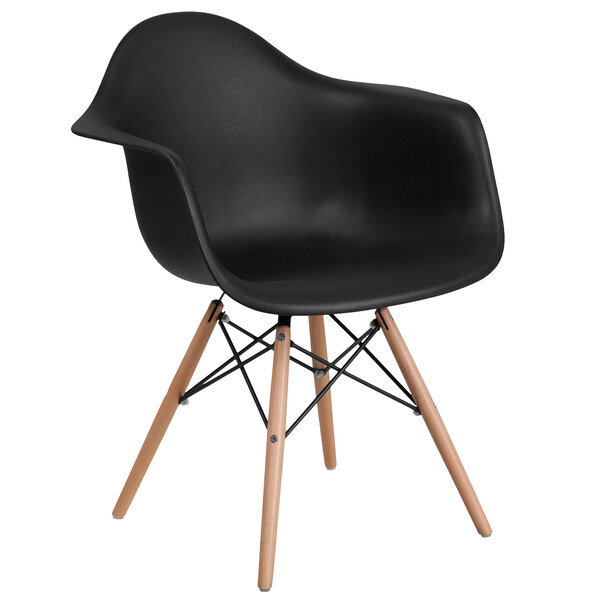 A Flash Furniture black plastic chair with wood legs.