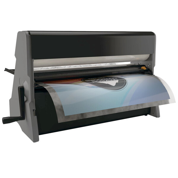 A black and grey Xyron XM2500 laminator with a paper roll.