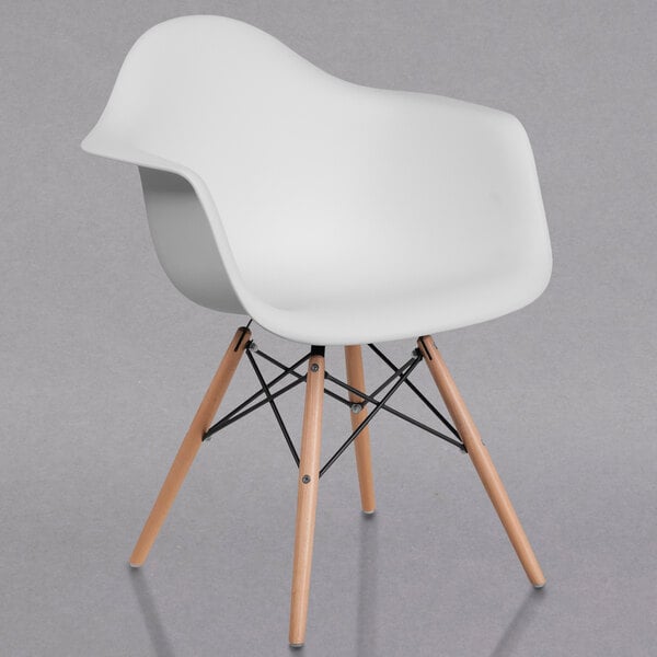 A white Flash Furniture Alonza plastic chair with wooden legs.