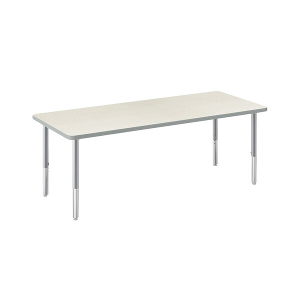 A white rectangular table with silver mesh legs.