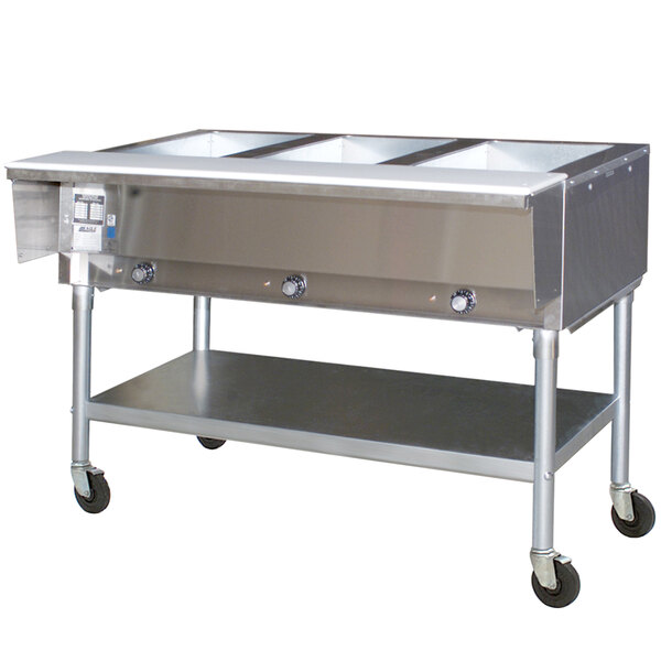 A stainless steel Eagle Group portable electric hot food table with three open wells on a counter.