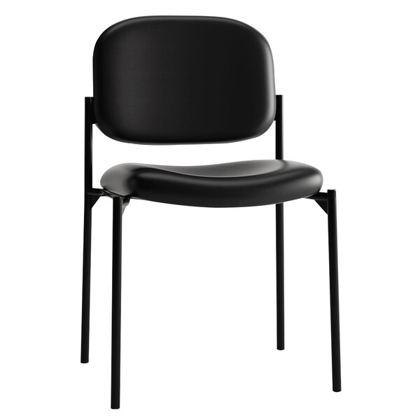 A HON black leather guest chair with metal legs.