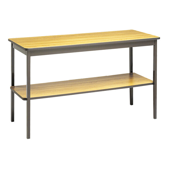 A Barricks rectangular utility table with a wooden shelf and metal legs.