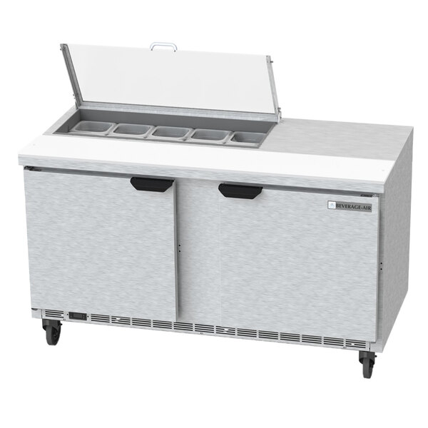 A Beverage-Air refrigerated sandwich prep table with two doors open.