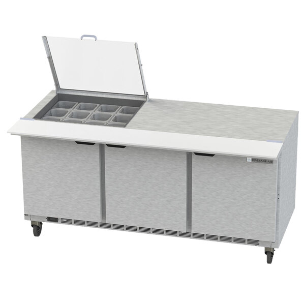 A Beverage-Air stainless steel commercial sandwich prep table with three doors and a mega top.