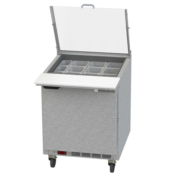 A Beverage-Air silver refrigerated sandwich prep table with a door open.