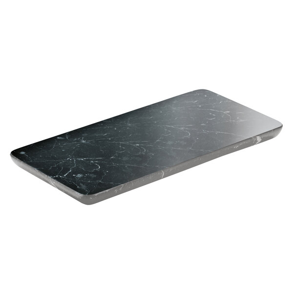 A rectangular black marbled surface.
