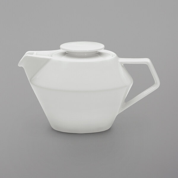 A white Schonwald porcelain teapot with a lid.
