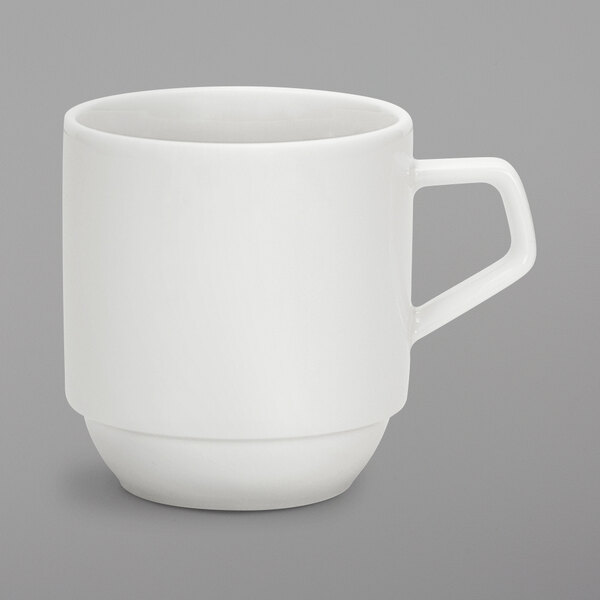 A Schonwald white porcelain mug with a white handle.