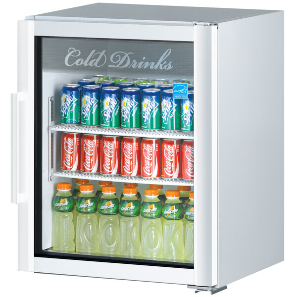 A white Turbo Air countertop display refrigerator with drinks inside.