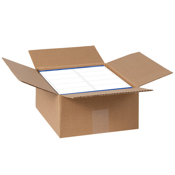 A cardboard box with white rectangular labels inside.