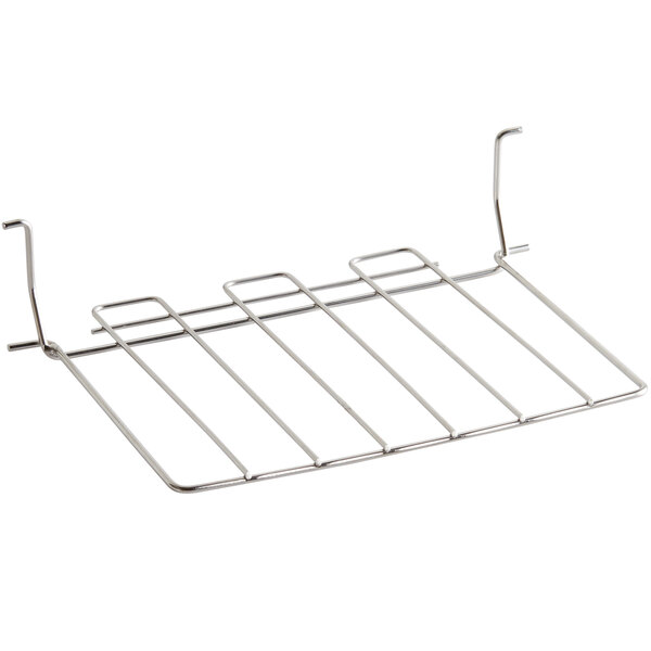 An Avantco loading tray with four wire shelves on it.
