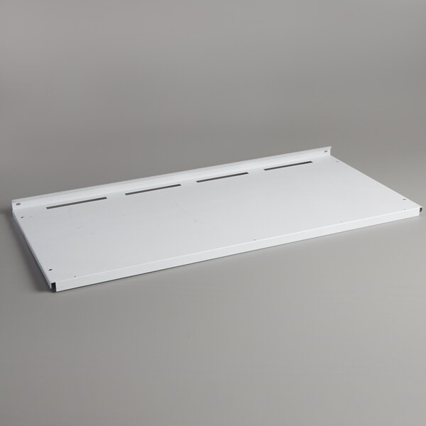 An Avantco white metal shelf with rectangular holes on a gray background.
