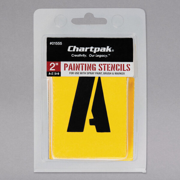 A yellow and black Chartpak stencil package with A-Z and 0-9 characters.