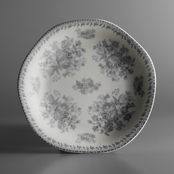 A grey porcelain Oneida Lancaster Garden plate with a floral design.
