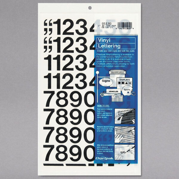 A sheet of paper with 44 black vinyl Helvetica numbers.