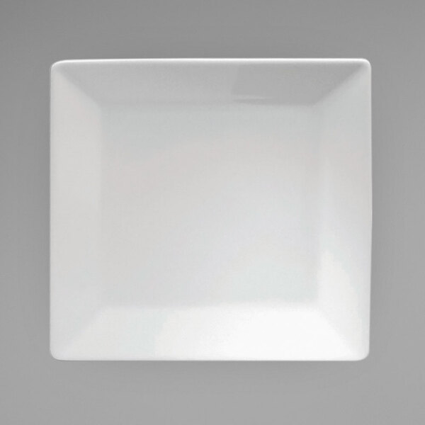 An Oneida Fusion bright white porcelain square plate on a grey background.