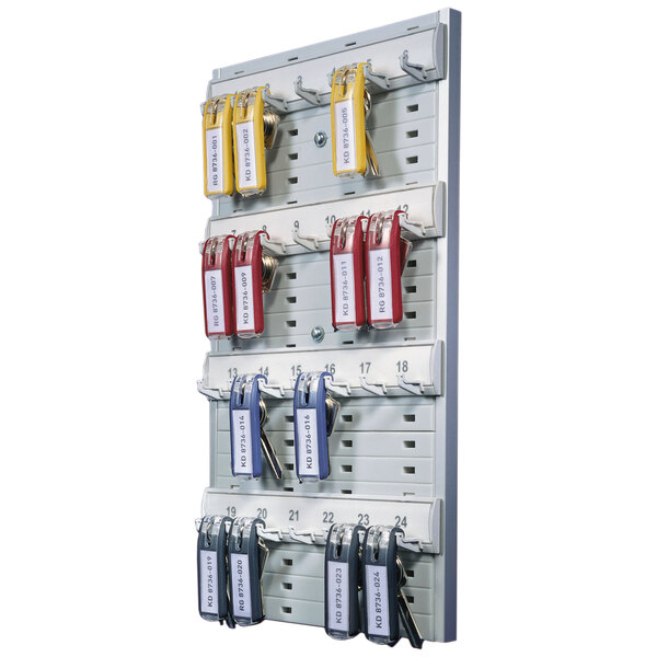 A gray plastic Durable key rack with 24 tags.
