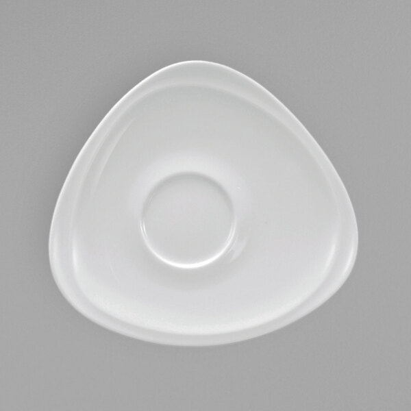 A white porcelain saucer with a circular center.