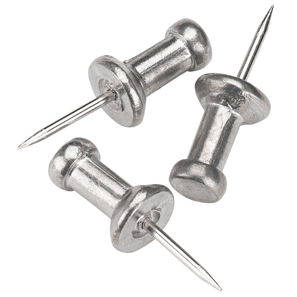 Three aluminum push pin heads.