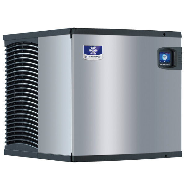 A silver and black Manitowoc air cooled ice machine with metal vents.