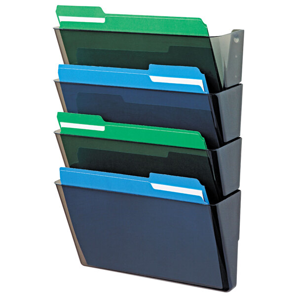 A Deflecto stackable wall file system holding blue, green, and white file folders.