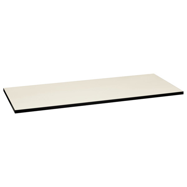 A white rectangular HON table top with black mesh edges.