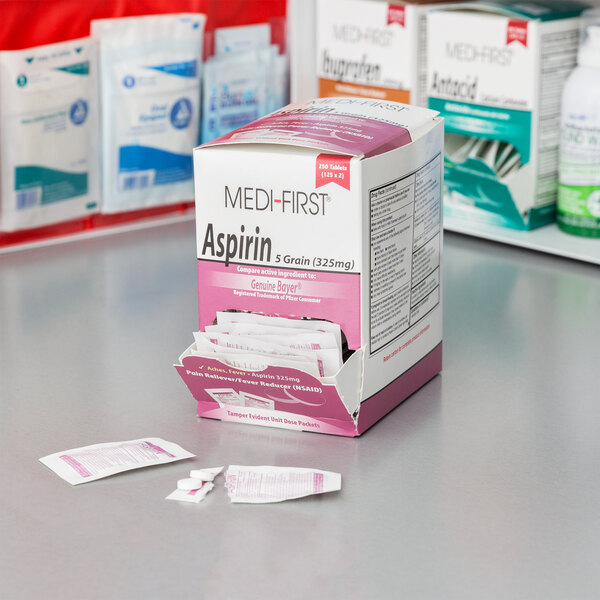 A box of Medi-First Aspirin tablets on a counter.