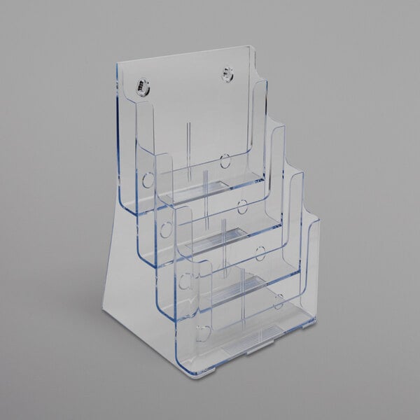 A clear plastic Deflecto magazine holder with four compartments.