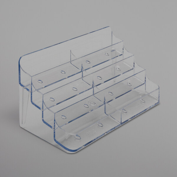 A Deflecto clear plastic business card holder with 8 pockets.