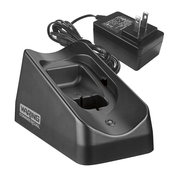 A black Waring battery charger with a power cord.