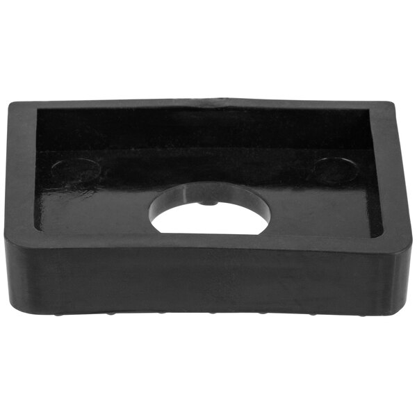 A black rectangular rubber foot with a hole in the middle.