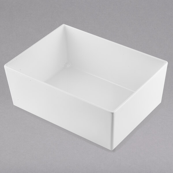 A white rectangular Tablecraft bowl with a clear bottom.