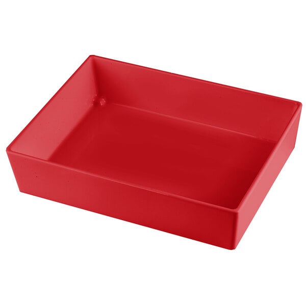 A Tablecraft red cast aluminum rectangular bowl on a table.
