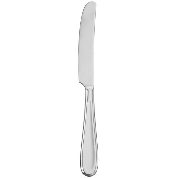 A Walco stainless steel table knife with a silver handle.