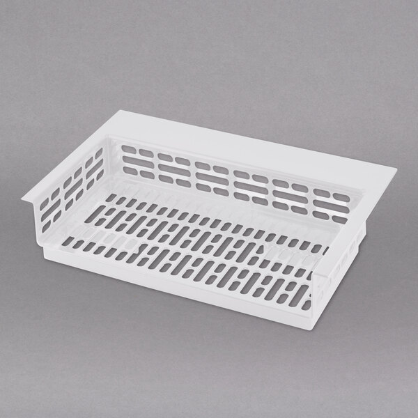 A white plastic tray with holes on it.
