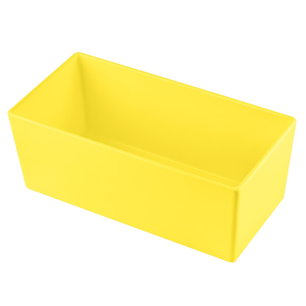A yellow rectangular Tablecraft bowl.